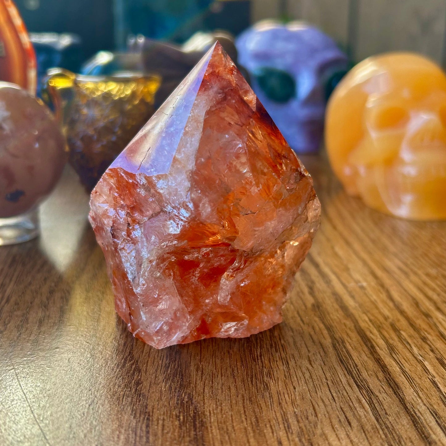 Crystal on a wooden surface with blurred background