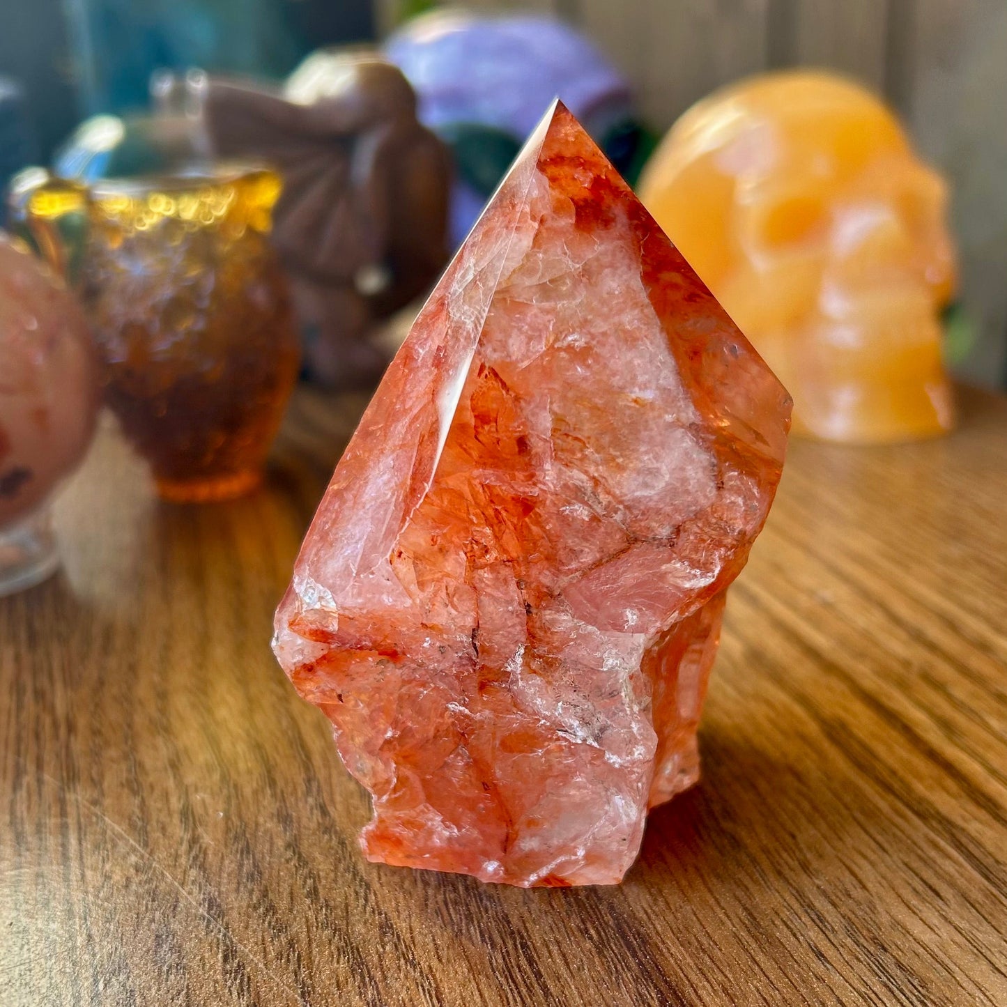 Crystal on a wooden surface with blurred background