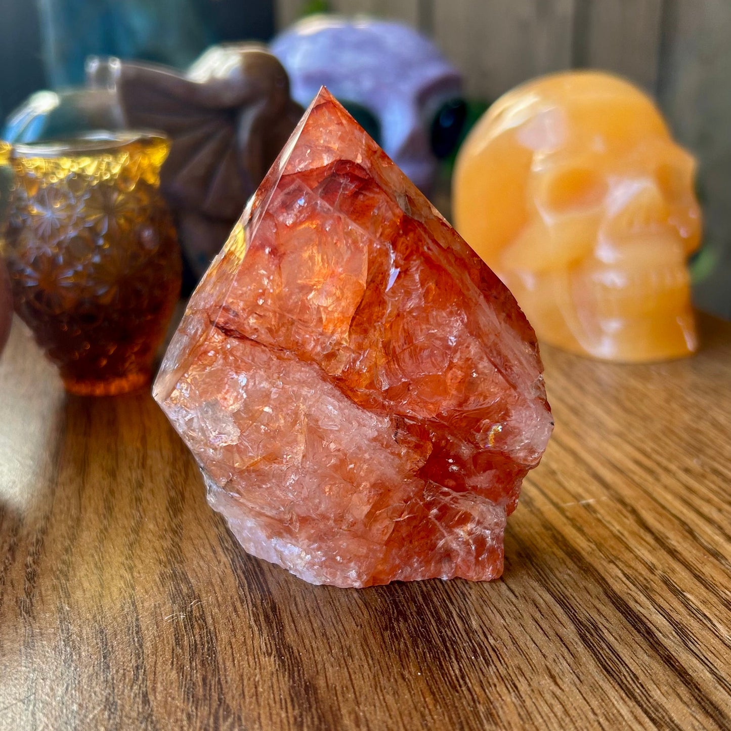 Crystal on a wooden surface with blurred background