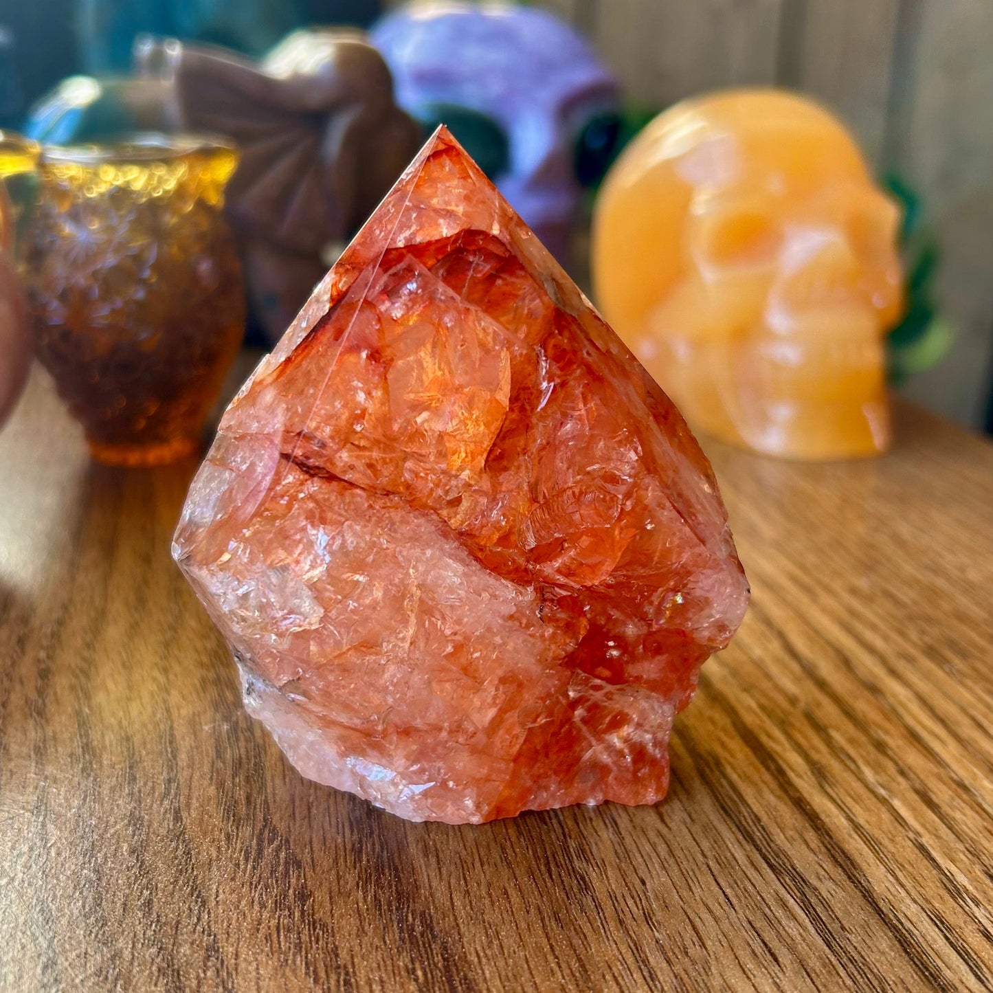 Crystal on a wooden surface with blurred background