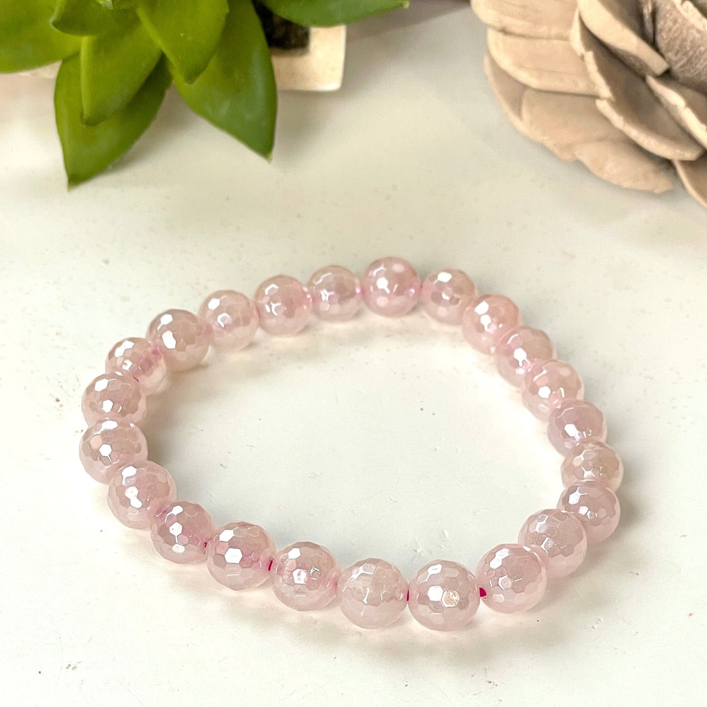 Aura Rose Quartz 8mm Faceted Beaded bracelet