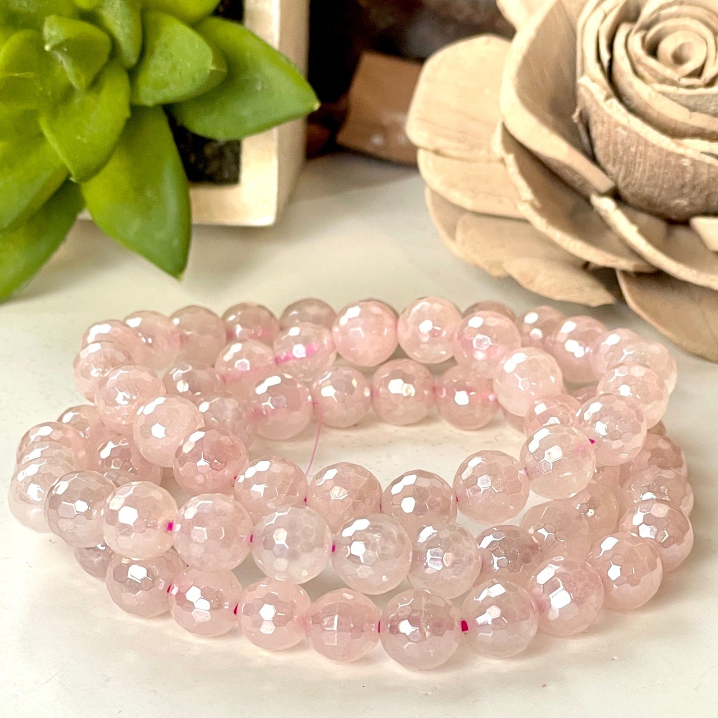 Aura Rose Quartz 8mm Faceted Beaded bracelet