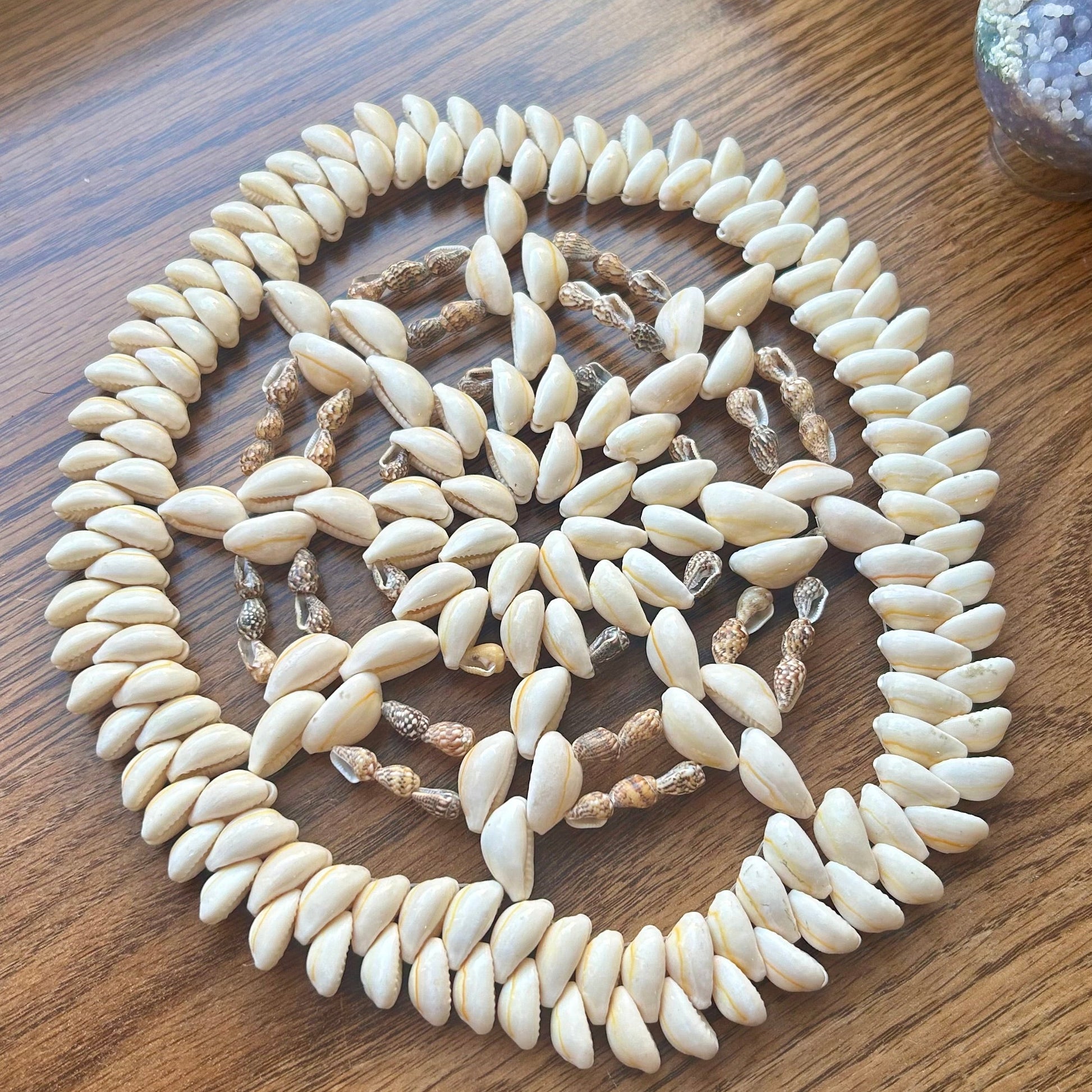 Decorative shell pattern on a wooden surface