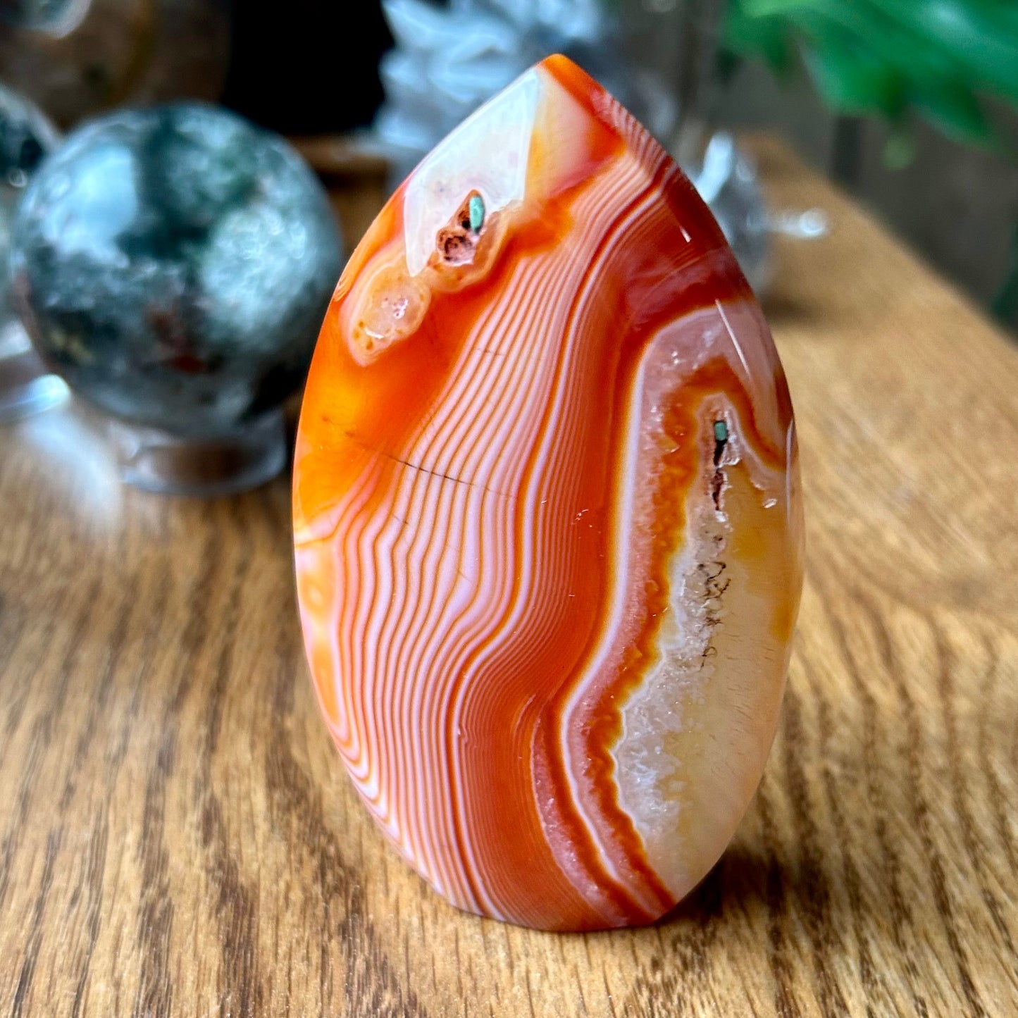 Agate stone on a wooden surface with blurred background