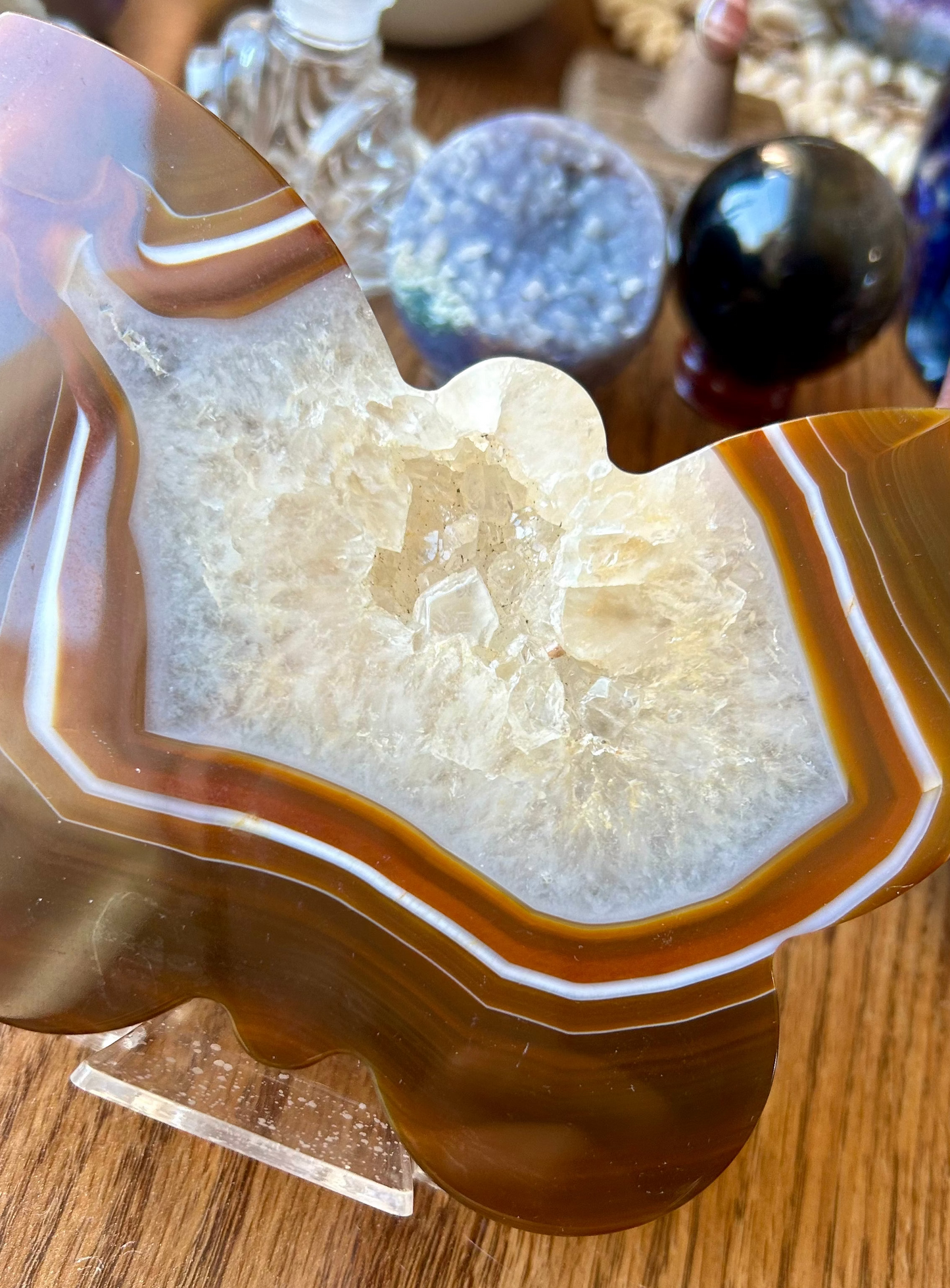 Crystal on a decorative stand with a wooden surface background