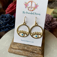 Dangling Eye Earrings