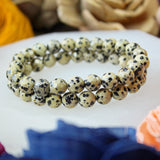 Dalmatian Jasper faceted 8mm beaded bracelet